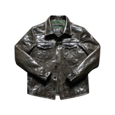 Olive green men's leather military jacket with button front closure and multiple pockets