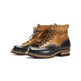 A pair of men's two-tone lace-to-toe boots made from Horween leather, featuring a brown upper and black accents.