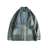 A washed blue denim kendo jacket with a single chest pocket and two waist pockets, displayed on a white background.