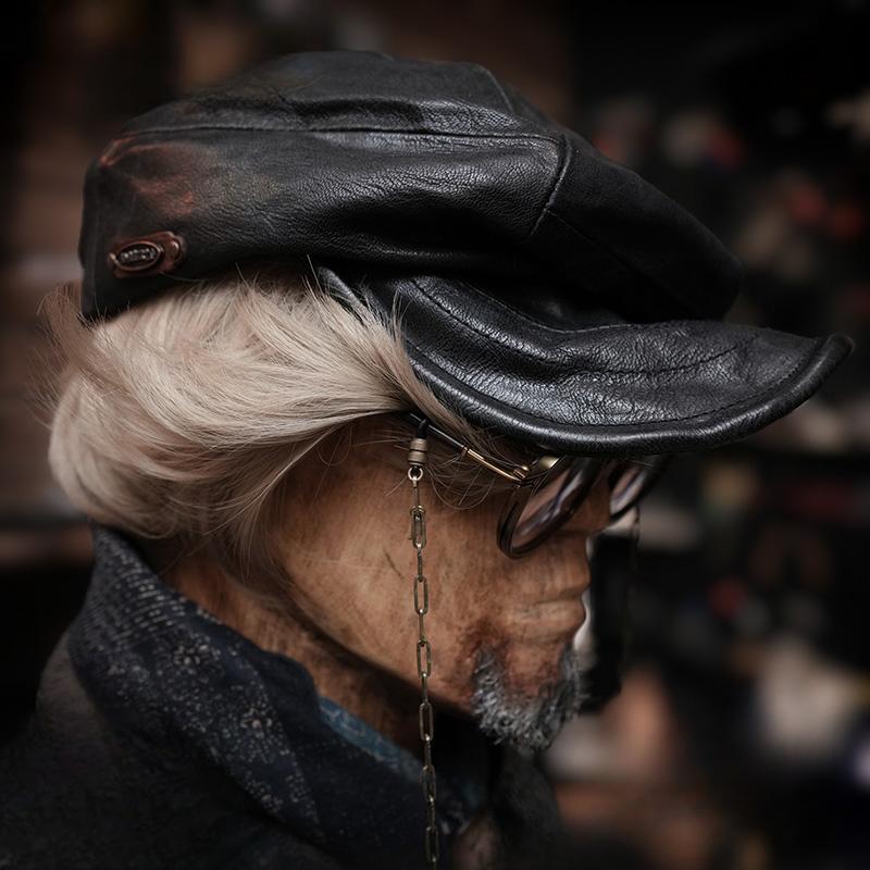 Casquette à visière en cuir noir