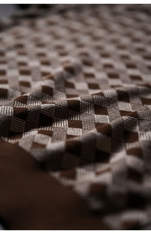 Polo tricoté à motif argyle pour homme