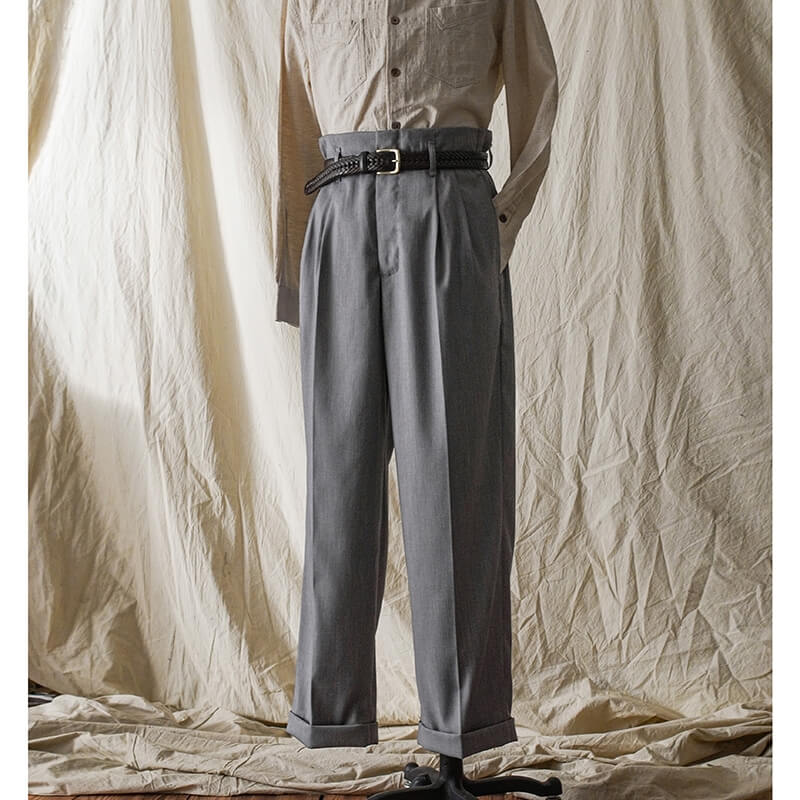 1940s high waist wide leg trousers in gray, displayed on a mannequin against a beige background.