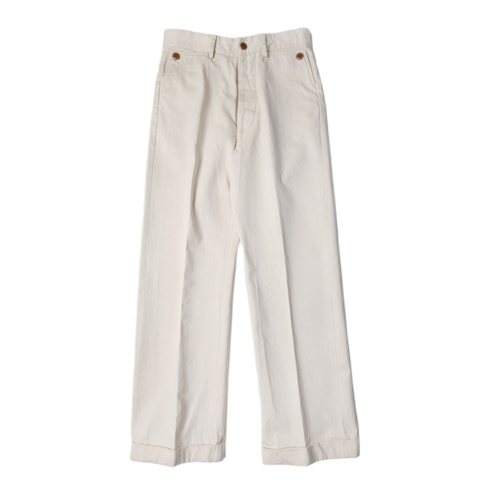 A pair of beige, high-waisted, wide leg chino pants with brass front fruit buckle closure.